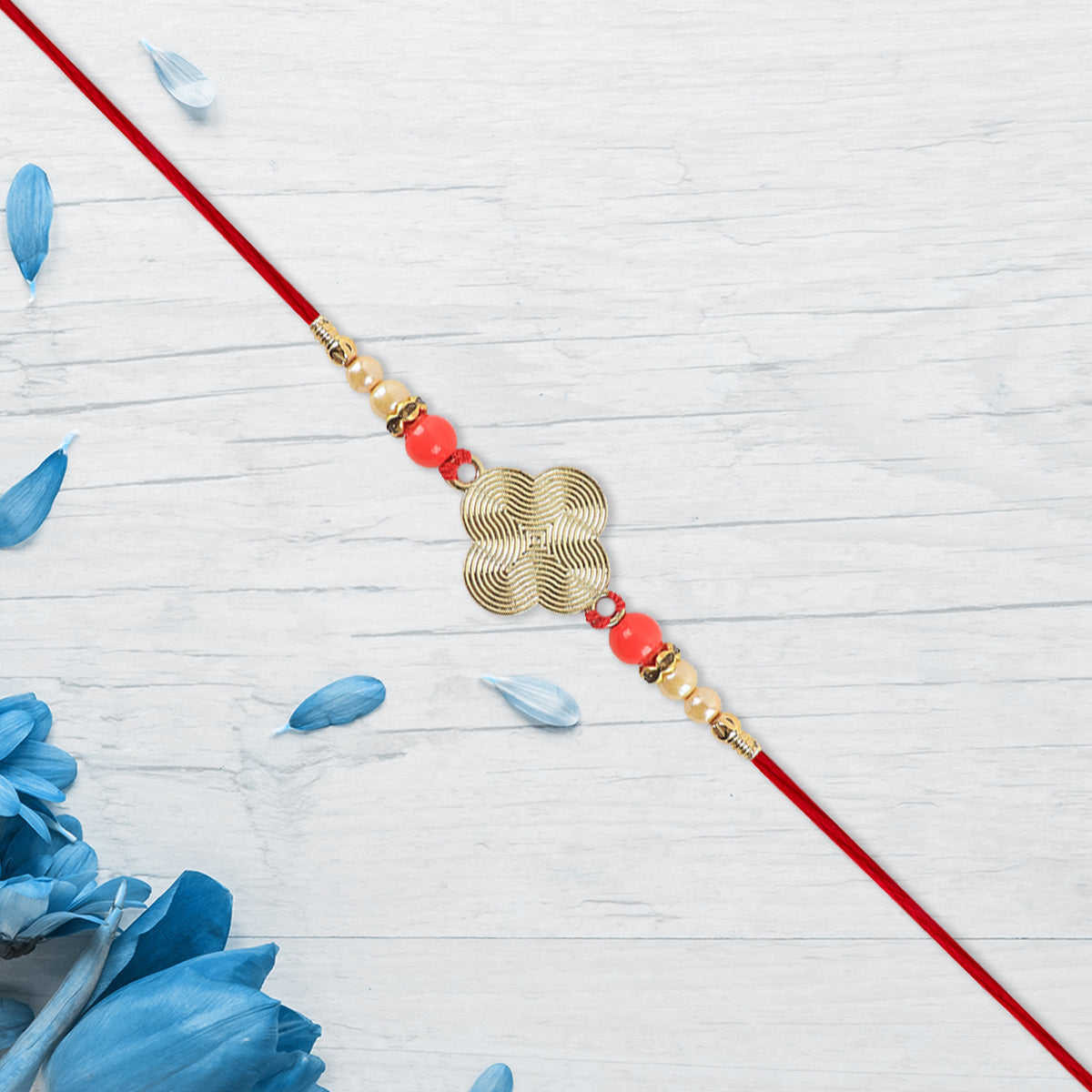 Rakhi With Multicolor Beads Silver Accents On Red Thread